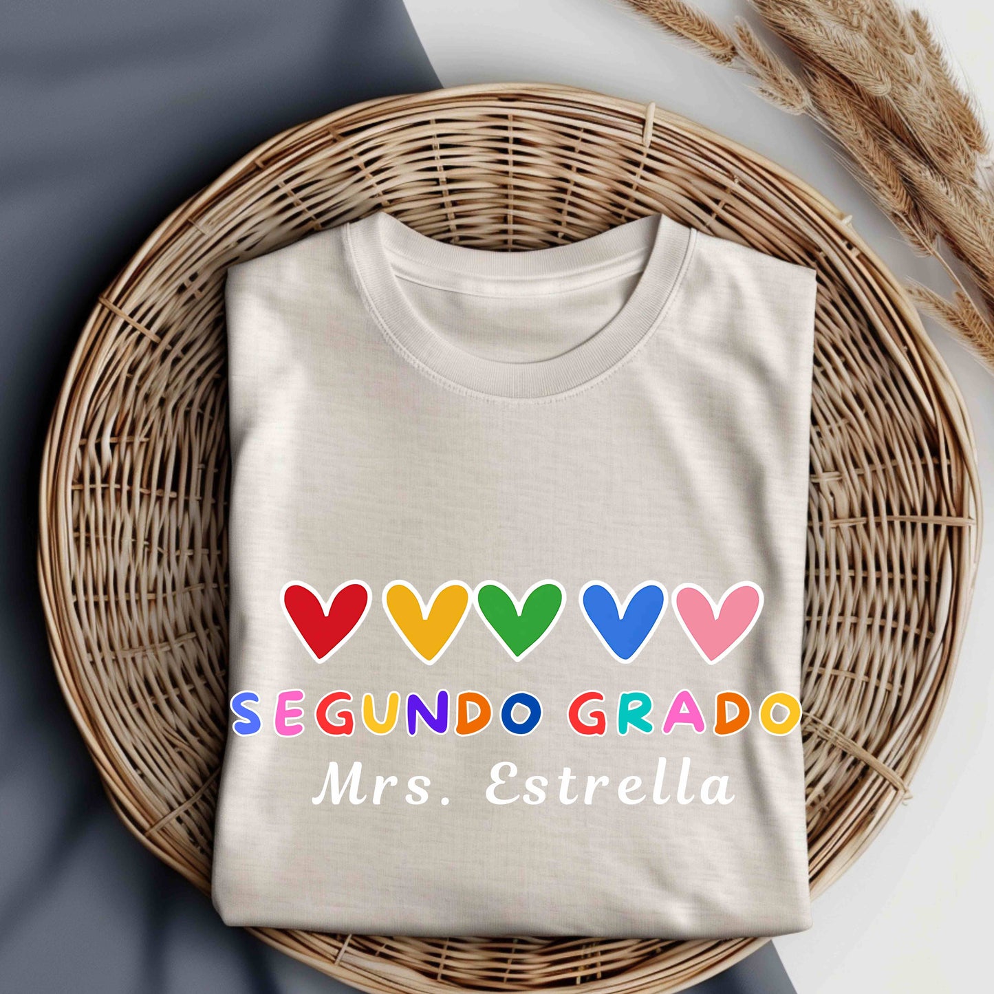 Personalized Segundo Grado Teacher T-Shirt with rainbow hearts. Perfect bilingual teacher shirt, back-to-school outfit, or custom educator gift.