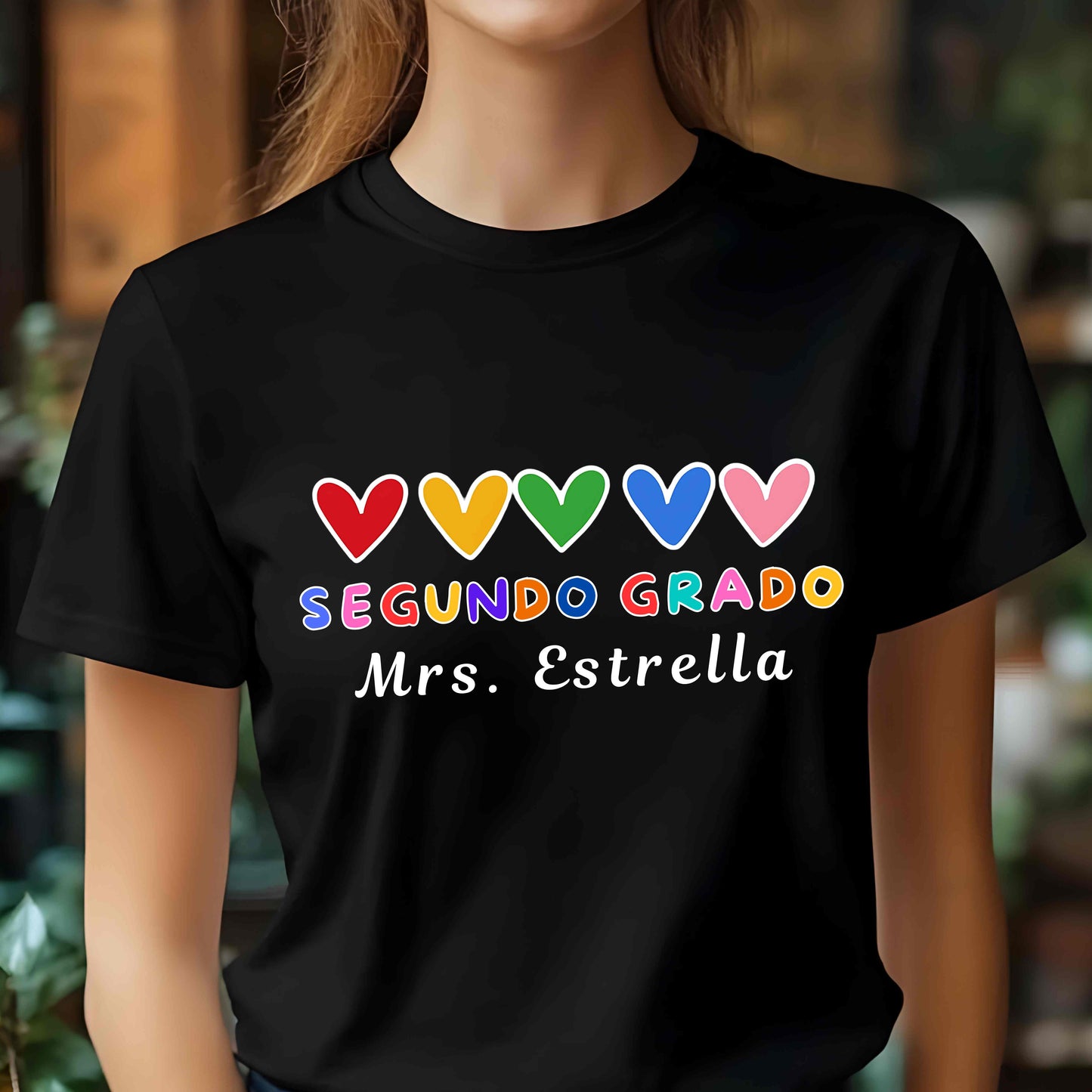 Personalized Segundo Grado Teacher T-Shirt with rainbow hearts. Perfect bilingual teacher shirt, back-to-school outfit, or custom educator gift.