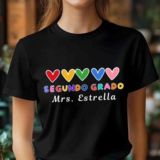 Personalized Segundo Grado Teacher T-Shirt with rainbow hearts. Perfect bilingual teacher shirt, back-to-school outfit, or custom educator gift.